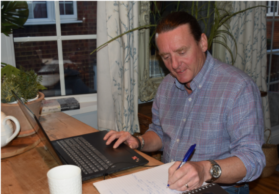 Me working on my laptop from home.