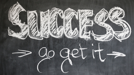 A blackboard with the words "Success go get it" written on it.
