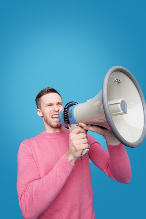 A man with a megaphone.