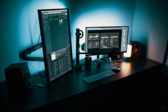 A computer on a desk.